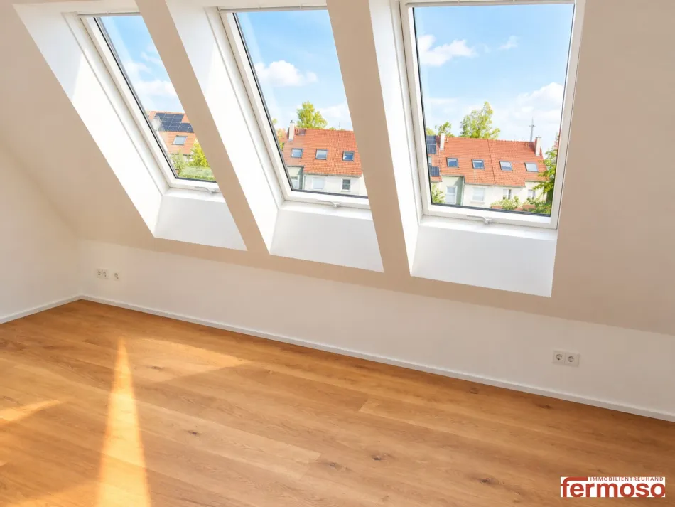 Moderne 3-Zi-Dachgeschosswohnung mit Rundumblick-Terrasse, Klimaanlage & Tiefgarage in Leopoldsdorf! - Bild