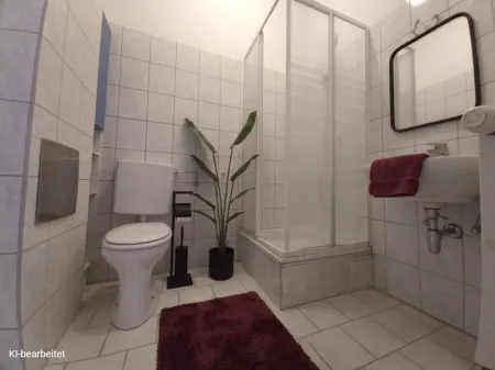 Badezimmer mit WC KI