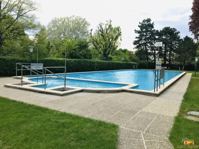 Gut angelegt: 2-Zimmer Wohnung mit tollem Gemeinschaftsgarten & Swimmingpool! - Titelbild