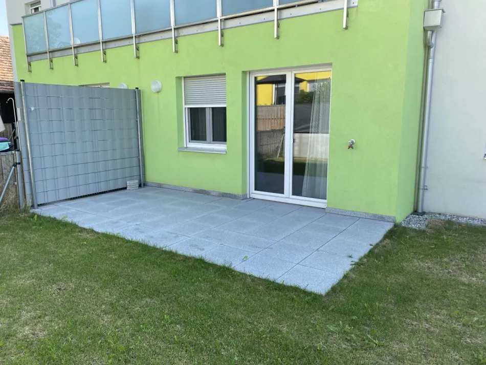 Gartenwohnung inkl. Einbauküche, Carport und großem Kellerabteil - Titelbild