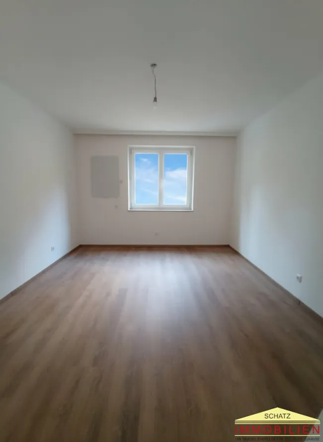 Einladende Wohnung mit Balkon und Stellplatz - Bild