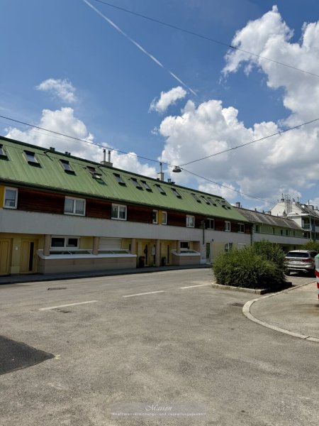 LICHTDURCHFLUTETE MAISONETTWOHNUNG MIT TERRASSE UND EIGENTUMSGARAGE - NATURNAHES LEBEN IM URBANEN KOMFORT