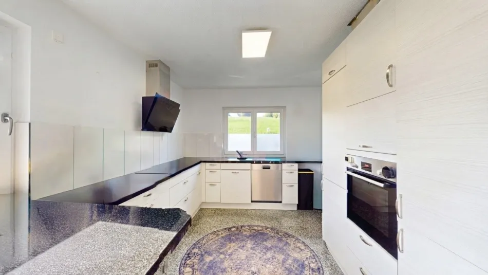 01 Wohnbereich mit Kamin und Ausblick