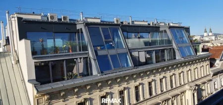 Moderner Dachausbau auf historischem Bestand