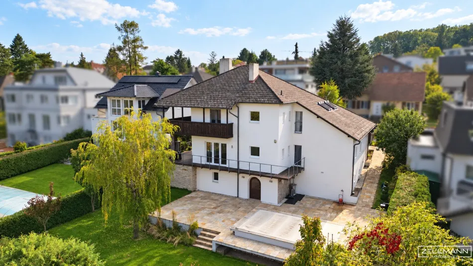 AM LAINZER TIERGARTEN | ARCHITEKTENVILLA MIT POOL – AUSSERGEWÖHNLICHE ARCHITEKTUR IN EXKLUSIVER GRÜNLAGE | ZELLMANN IMMOBILIEN - Titelbild