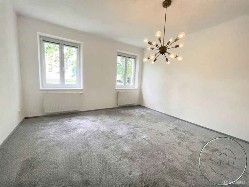 Geschütztes Refugium mit Blick ins Hof-Grün: Großzügige 3,5-Zimmer-Wohnung mit Balkon & Gestaltungsfreiraum - Bild