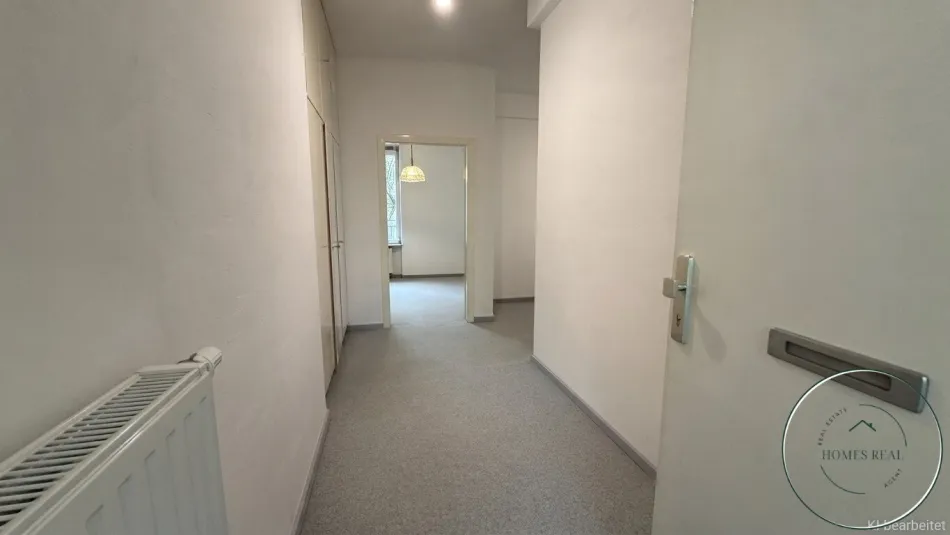 Geschütztes Refugium mit Blick ins Hof-Grün: Großzügige 3,5-Zimmer-Wohnung mit Balkon & Gestaltungsfreiraum - Titelbild