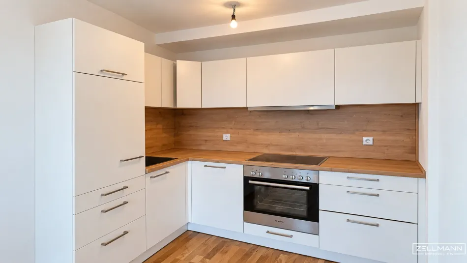 Kleines Raumwunder mit Balkon – gepflegtes Eigentum in 1100 | ZELLMANN IMMOBILIEN - Titelbild