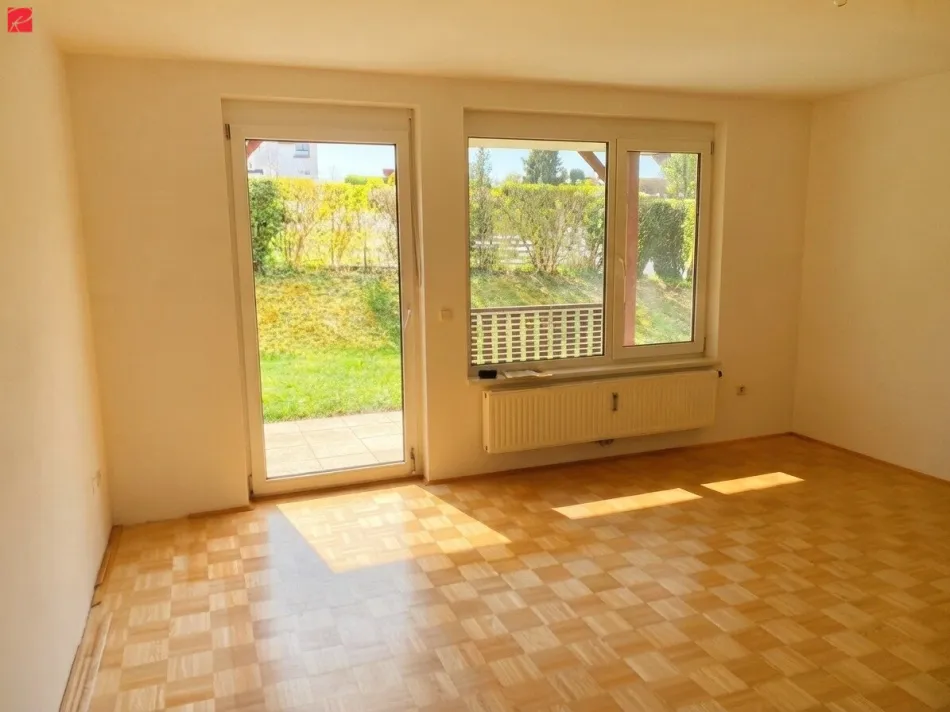 Gepflegte Gartenwohnung mit überdachter Terrasse - Bild