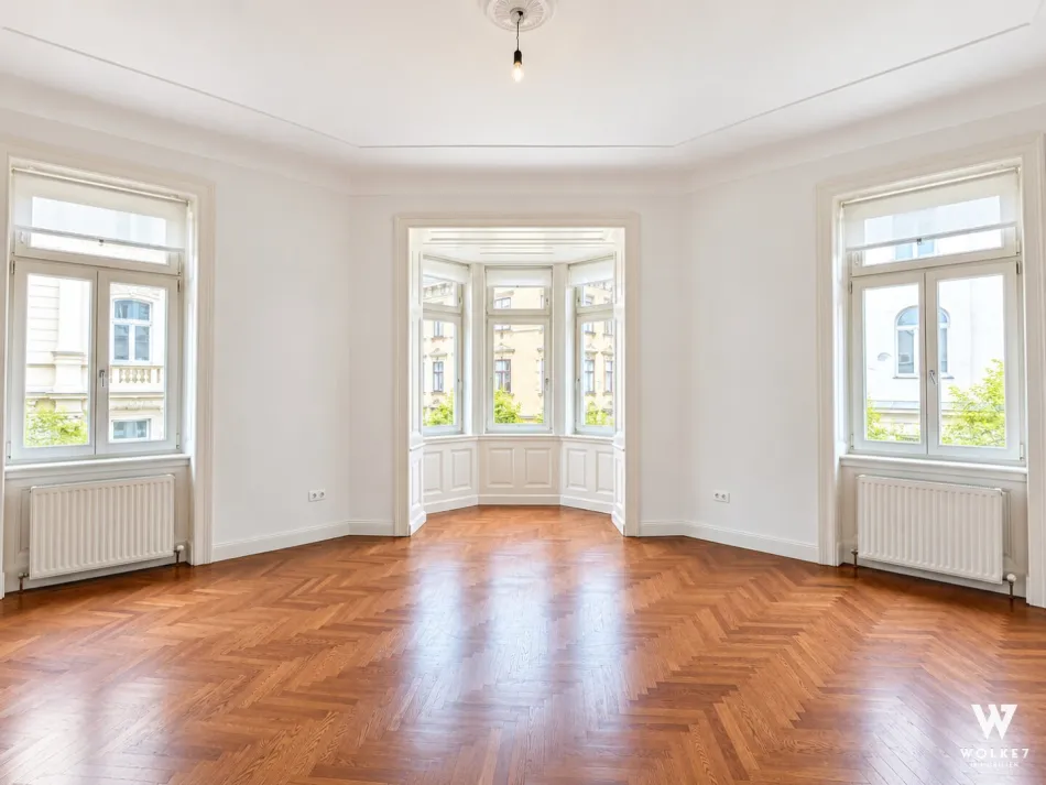+++ Stilvolle 114m²-Altbauwohnung in TOP LAGE mit Erker & Schwedenofen I Lift I Garage I Nähe Mariahilfer Straße ++ - Titelbild