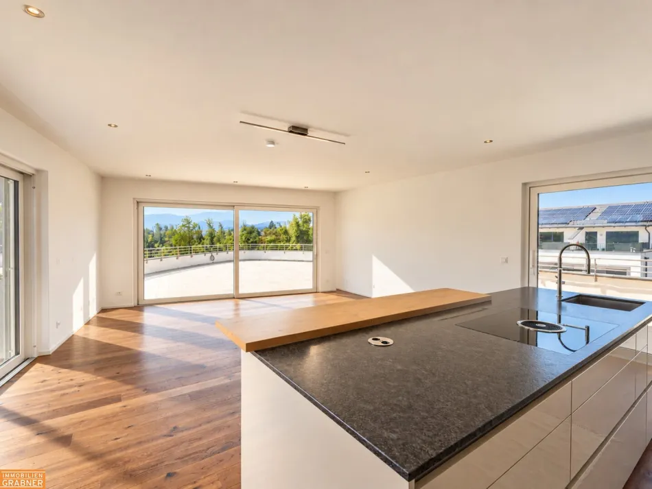 Exklusives Penthouse mit 180 m² Dachterrasse und Traunsteinblick - Titelbild