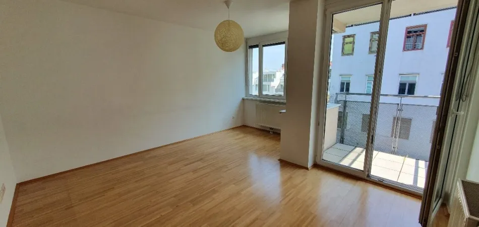 Zentrumsnah & absolut ruhig! Moderne, hofseitige 2 Zimmer-Balkonwohnung mit Garage! - Titelbild