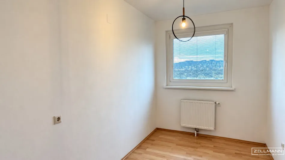 Ihr Logenplatz über der Südstadt – 3 Zimmer, große Loggia und herrlicher Weitblick im 9. Liftstock! | ZELLMANN IMMOBILIEN - Bild