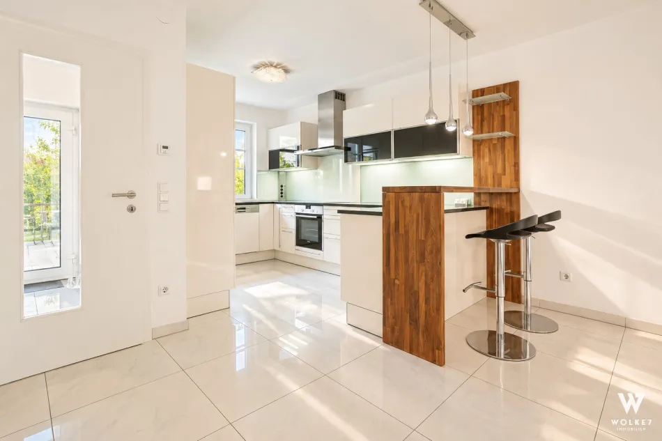 Großzügige 3-Zimmer-Maisonette mit Hauscharakter | Eigengarten & sonnige Süd-Freiflächen | Nahe Alter Donau I Top-U1-Anbindung | Garagenstellplatz - Bild