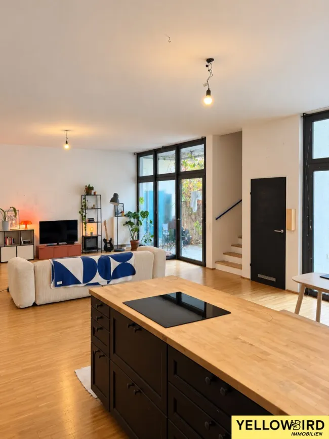Helle Neubau-Maisonette Wohnung mit privaten Garten & Loggia I Garage I Atelierwidmung - Titelbild