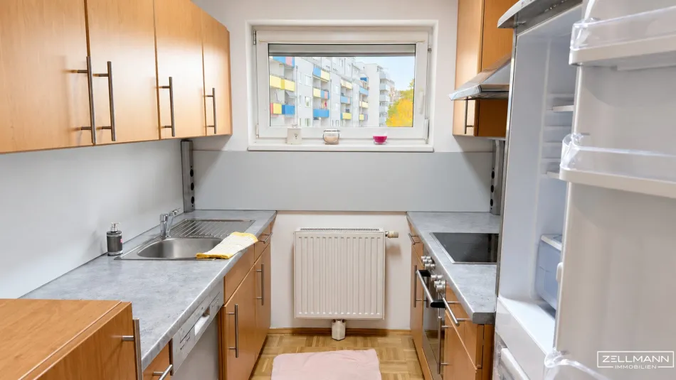 2 Zimmer, 11,71 m² Loggia & Tiefgarage – durchdacht wohnen nahe der U6 | ZELLMANN IMMOBILIEN - Bild