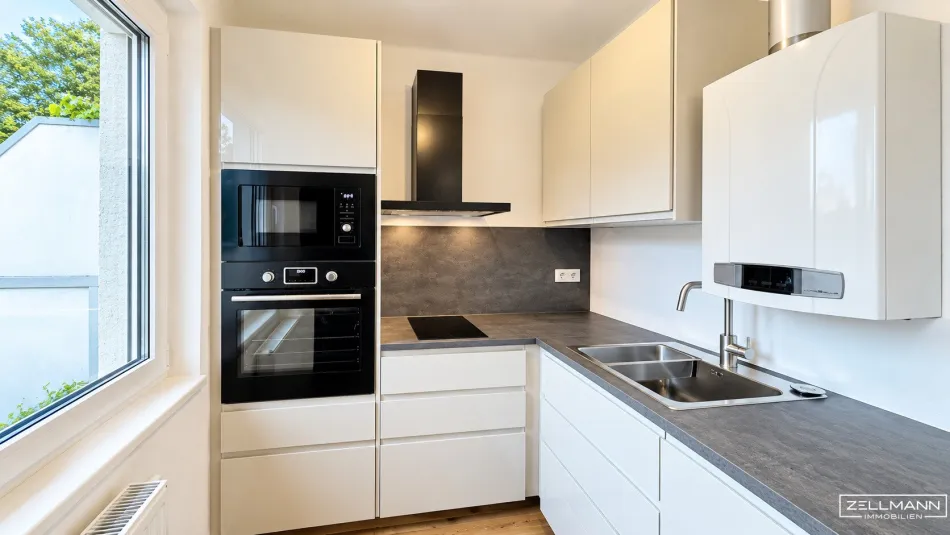 Klein, fein & clever investiert – saniertes Anlegerjuwel mit sonnigem Balkon in Wien-Mauer! | ZELLMANN IMMOBILIEN - Bild