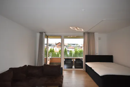 Wohn-, Koch-, Ess-, Schlafbereich - Modernes und geräumiges Appartement mit großer Loggia und Bergblick Miete Grödig Salzburg
