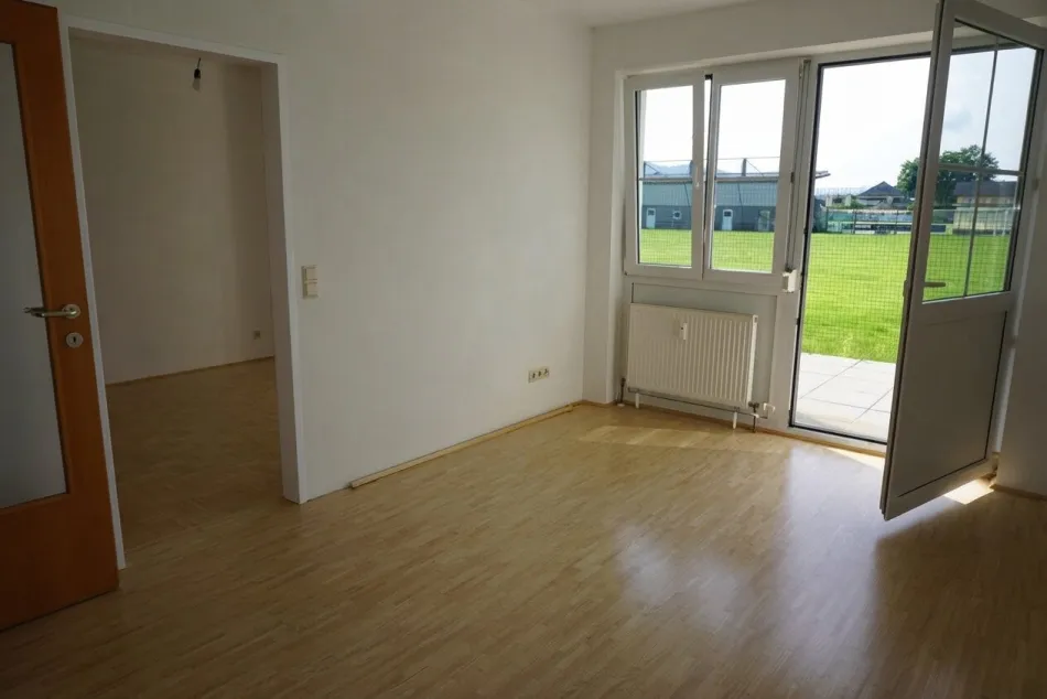 gemütliche 2-Zimmer Wohnung mit Garten, Terrasse und PKW-Stellplatz - Bild