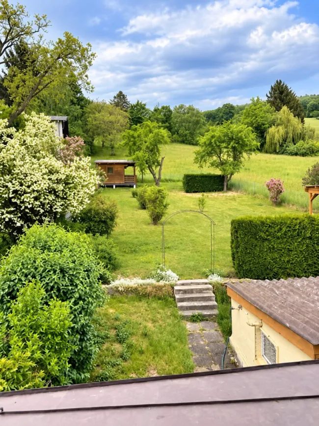 Wohnen mit Garten – Charmante Haushälfte mit besonderem Wohlfühlcharakter - Titelbild