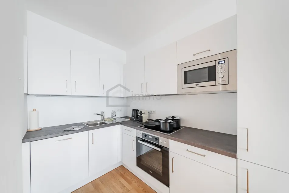 Helles 2-Zimmer-Apartment im 18. Stock mit Südbalkon – voll möbliert, all-inclusive | 1030 Wien - Bild
