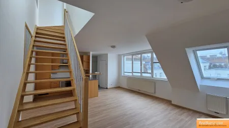 Wohnesszimmer mit Einbauküche