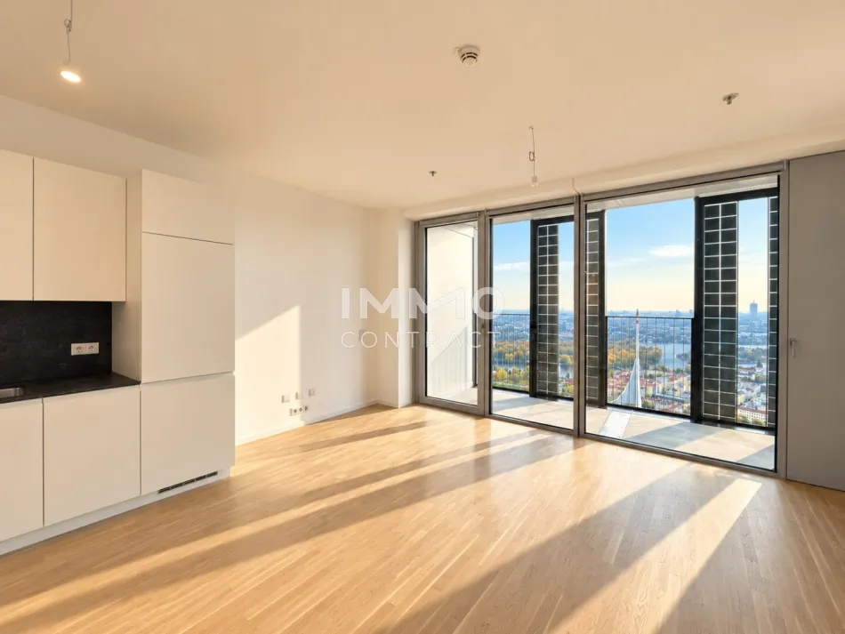 49. Etage – Exklusives City-Studio im DC2 Tower mit Loggia und Fernblick - Titelbild