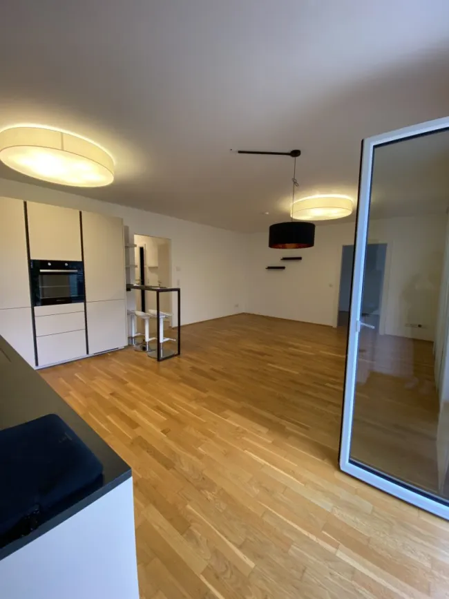 Stilvolle Gartenwohnung in Graz mit Terrasse, 2 TG-Stellplätzen und Fußbodenheizung - Bild