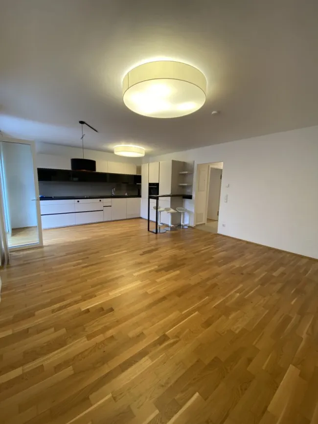Stilvolle Gartenwohnung in Graz mit Terrasse, 2 TG-Stellplätzen und Fußbodenheizung - Titelbild