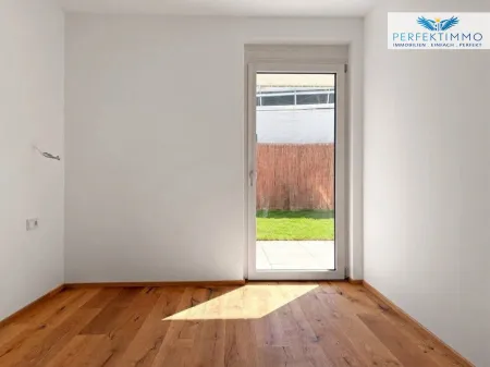 Neubau: 2-Zimmer-Wohnung mit Terrasse und Garten Top 2