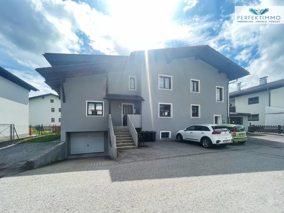 Mehrfamilienhaus mit großem Garten - Titelbild