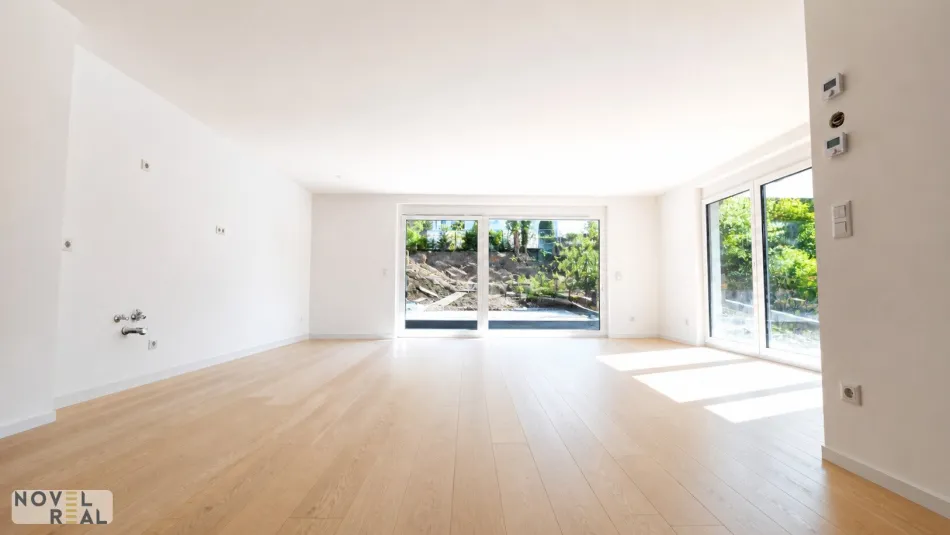 Kurz vor Fertigstellung: Großzügige 4,5-Zimmer-Gartenwohnung mit Terrasse, drei Balkonen und exklusivem Highlight – Pool im Gemeinschaftsgarten! - Titelbild