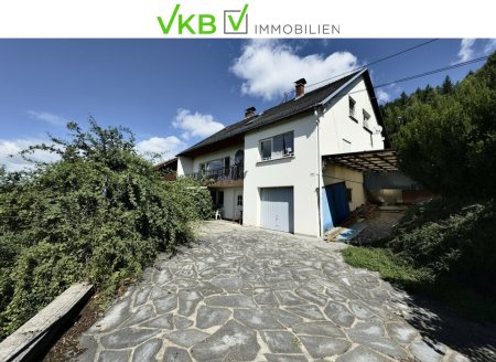 SCHLÜßLBERG | STRAßFELD: Idyllisches Zweifamilienhaus mit großzügigem, sonnigem Garten und beeindruckendem Fernblick!