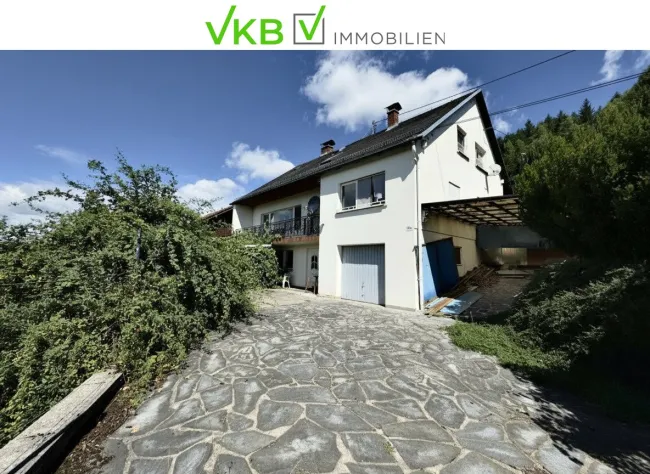 SCHLÜßLBERG | STRAßFELD: Idyllisches Zweifamilienhaus mit großzügigem, sonnigem Garten und beeindruckendem Fernblick! - Titelbild