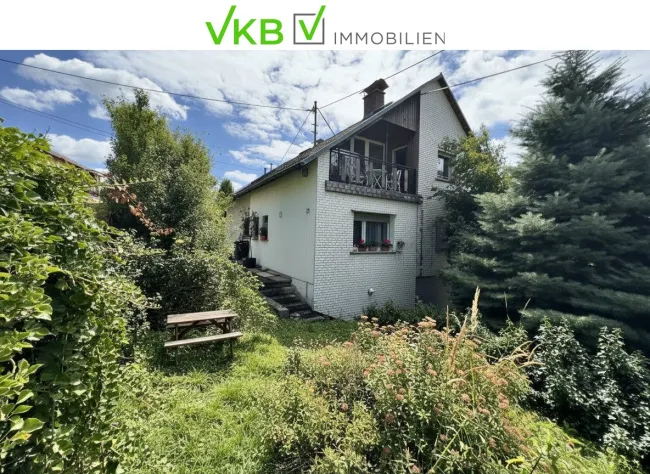 SCHLÜßLBERG | STRAßFELD: Idyllisches Zweifamilienhaus mit großzügigem, sonnigem Garten und beeindruckendem Fernblick! - Bild