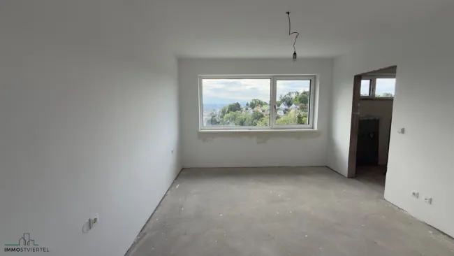 Schlafzimmer mit eigenem Bad und Ankleidebereich