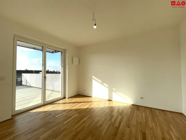 Schlafzimmer mit Zugang zur Dachterrasse