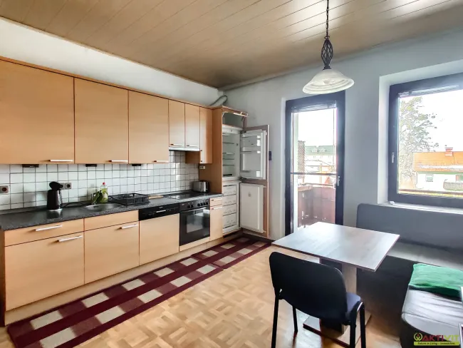 Charmante Eigentumswohnung mit Balkon, Garage und Garten in Mattighofen. - Titelbild