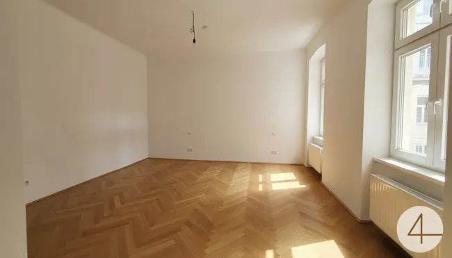 Wunderschön sanierte Altbauwohnung im 1. Liftstock mit ruhigem Balkon - Bild