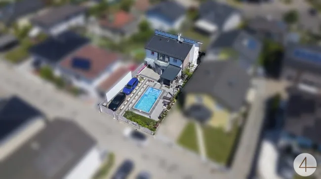 Luxus trifft Wohnkomfort – Einfamilienhaus mit beheiztem Pool und Privatstraße - Bild
