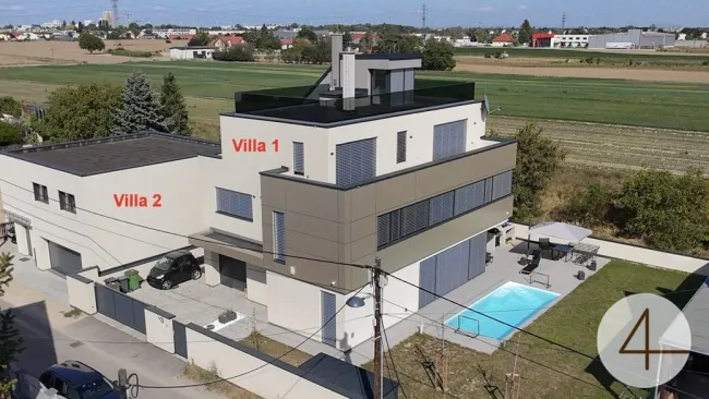 2 Premium-Villen direkt nebeneinander - mit grünem Weitblick - sonnige Ausrichtung - hochwertige Ausstattung - Salzwasserpool - Garage - Lift - Titelbild