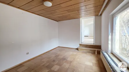 Hausanteil mit Garten und Nebengebäude