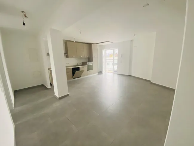 Attraktive Kapitalanlage: Vermietete 74 m² Wohnung mit Kfz-Abstellplatz in zentraler Lage - Titelbild