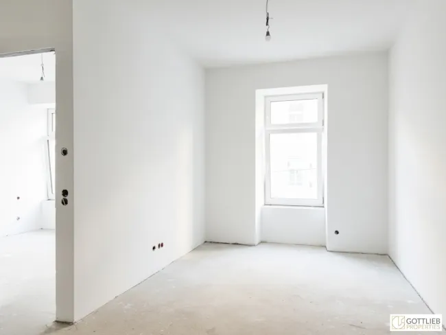 Erstbezug in U-Bahn-Nähe! Liebevoll generalsanierte 2-Zimmer-Altbau-Wohnung mit Loggia und Grünblick in Gründerzeithaus - Bild