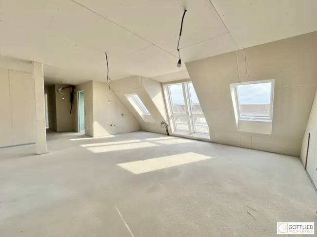Erstbezug in U-Bahn-Nähe! Lichtdurchflutetes 4-Zimmer-Penthouse mit zwei Balkonen und Dachterrasse mit Panoramablick - Bild