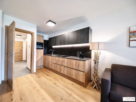 Bestlage Pinzgau mit ca. 6% Rendite! 3-Zimmer-Maisonette mit Terrasse, Balkon sowie beheiztem Aussenpool