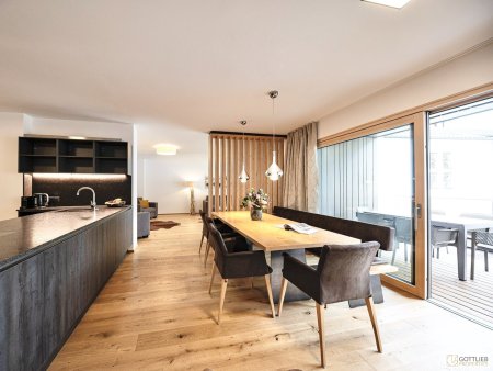Bestlage Pinzgau mit ca. 6% Rendite! Sieben Apartments mit Terrassen, Balkonen und beheiztem Aussenpool