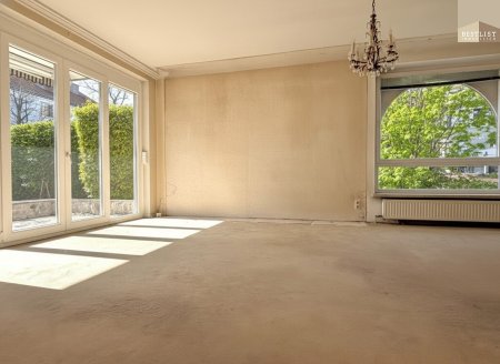 4-Zimmer-Terrassenwohnung mit ca.100m² Garten und TG Stellplatz