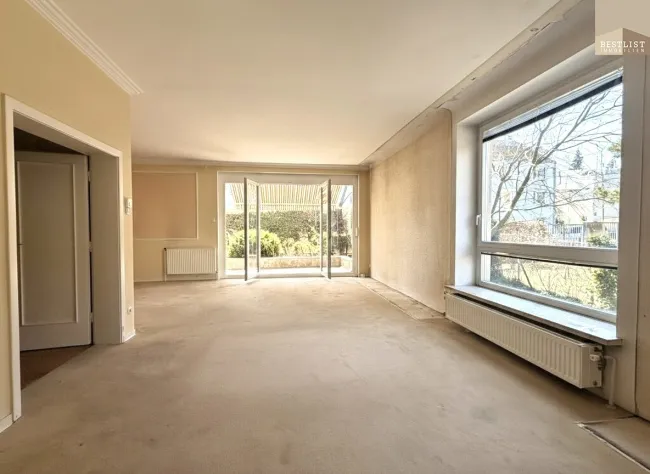 4-Zimmer-Terrassenwohnung mit ca.100m² Garten und TG Stellplatz - Titelbild