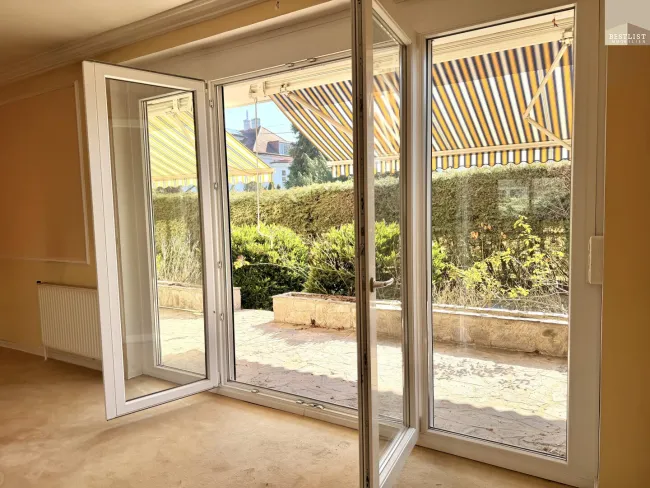 4-Zimmer-Terrassenwohnung mit ca.100m² Garten und TG Stellplatz - Bild